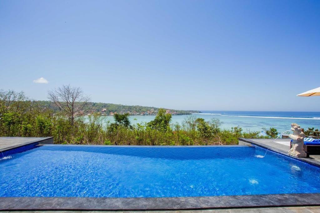 נוסה-למבונגן Ocean Paradise Cottage מראה חיצוני תמונה